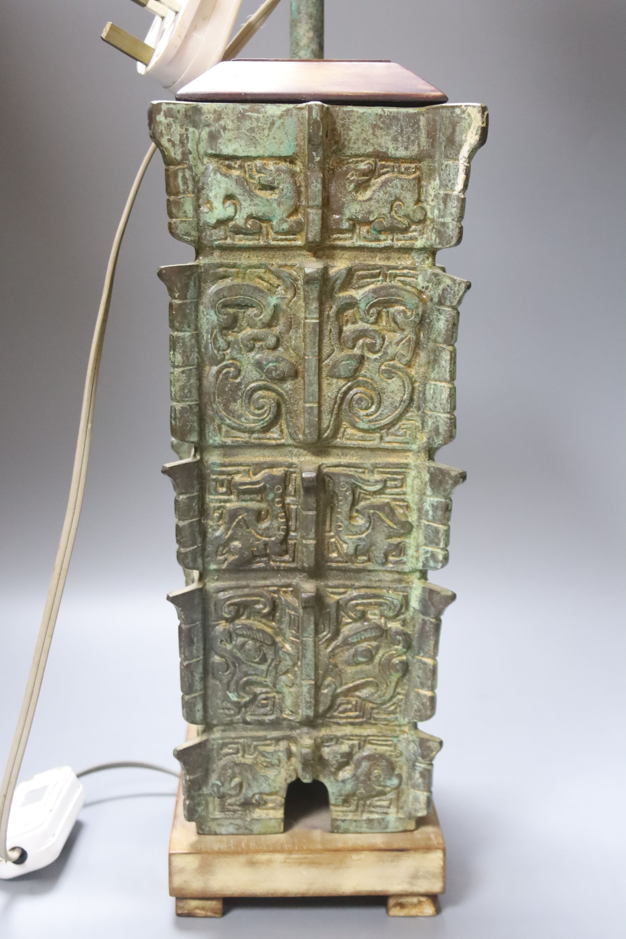 A Chinese archaistic cast vase, now as a lamp and a Chinese ceramic table lamp, tallest 38cm